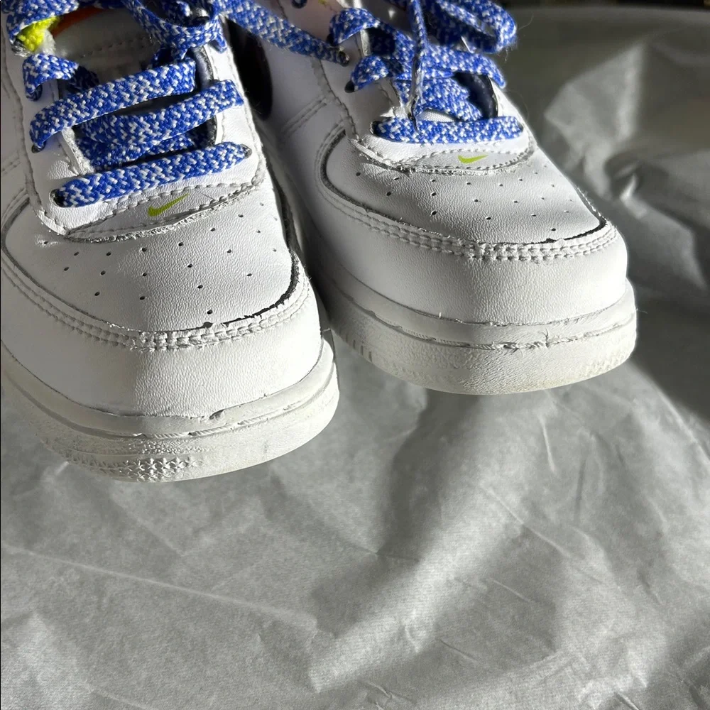 Nike White Sneakers with Blue and Yellow Highlights